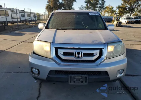 2010 Honda Pilot Touring z USA, uszkodzony, nr VIN 5FNYF4H97AB006893